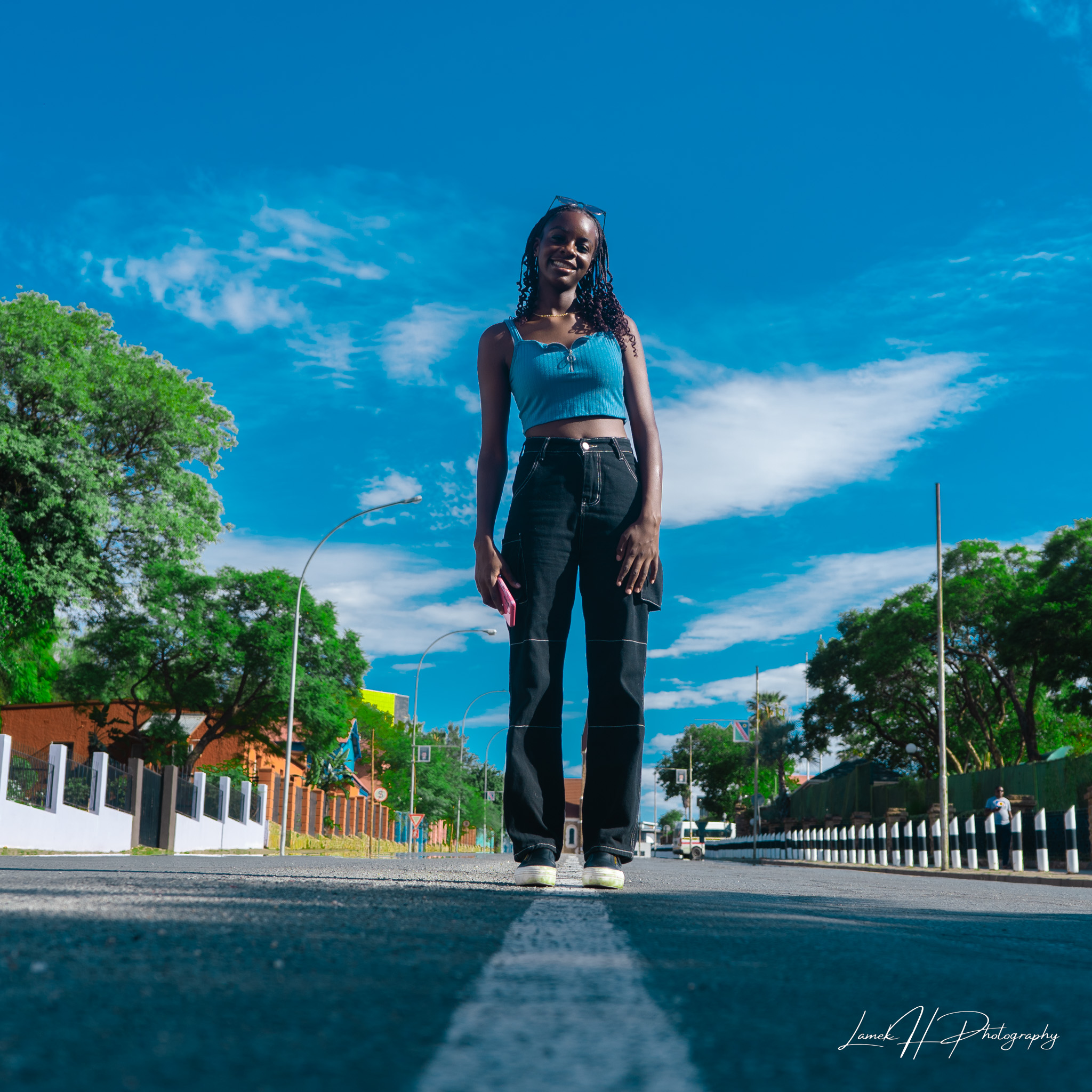 Freelance portrait photography of a smiling model in golden hour